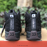 Side profile of Nike all-black sneakers heritage-inspired look