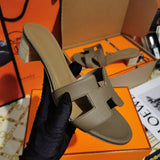 Hermès Tan Flat Thong Sandals - Front View