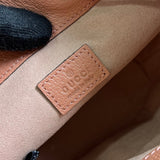 Styled lifestyle shot of refined signature women's handbag – women's statement bag