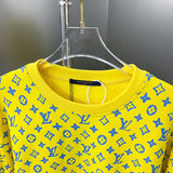 Close-up detail shot of Louis Vuitton luxury clothing with everyday silhouette