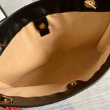 Side profile of elevated polished women's handbag – women's designer-style accessory