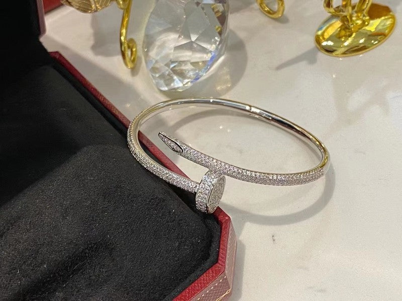 Front view of Cartier unisex jewelry piece