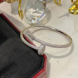 Front view of Cartier unisex jewelry piece