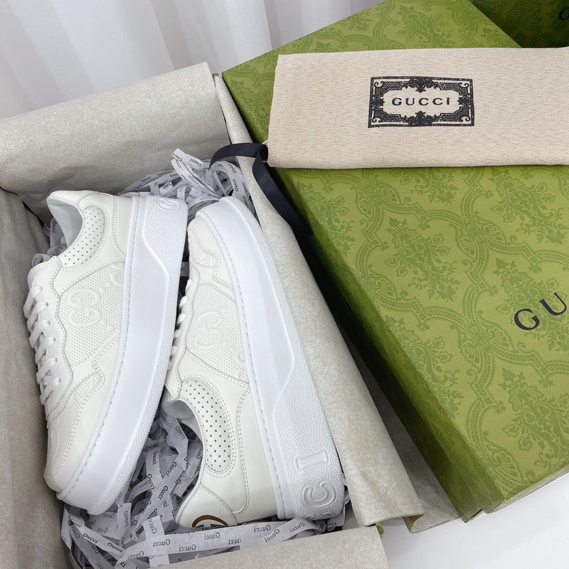 Side profile of Gucci two-tone sneakers minimalist modern build