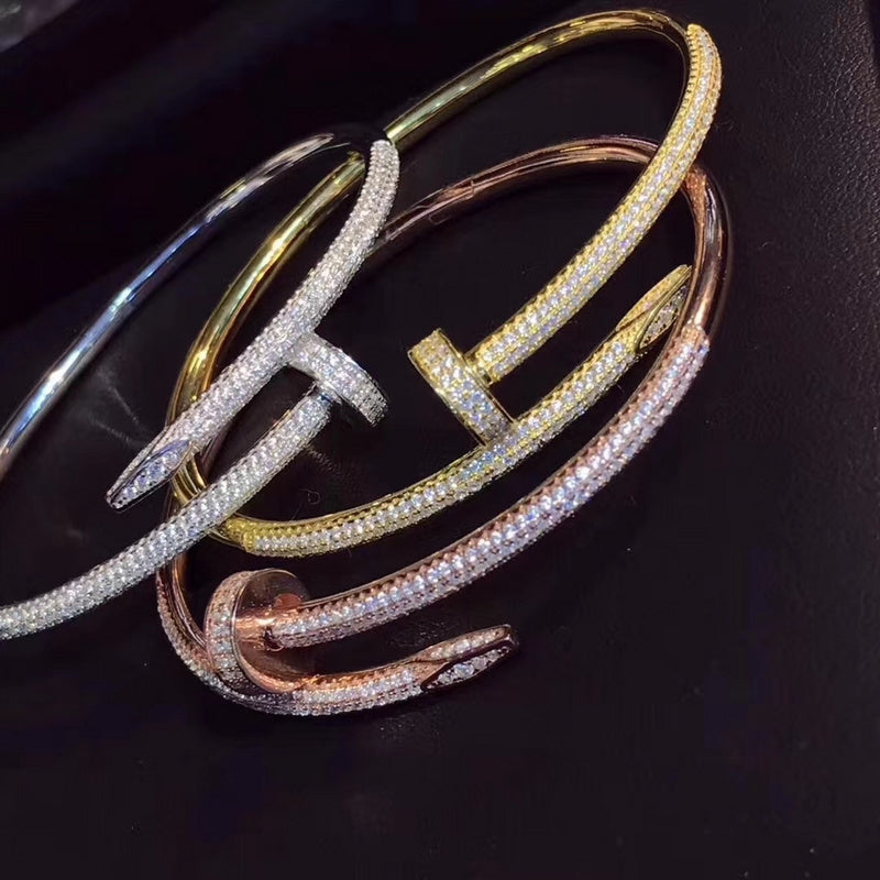 Side view of Cartier unisex jewelry piece
