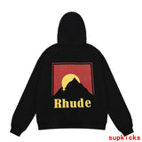 Flat lay presentation of Rhude luxury clothing with streetwear-inspired cut