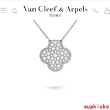Lifestyle view of Van Cleef & Arpels unisex jewelry piece