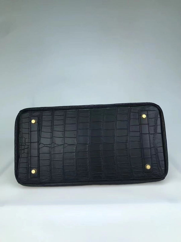 Side view of contemporary structured handbag