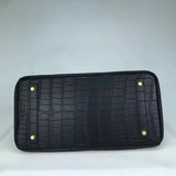 Side view of contemporary structured handbag
