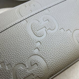 Styled lifestyle shot of everyday-luxe structured women's handbag – women's luxury accessory