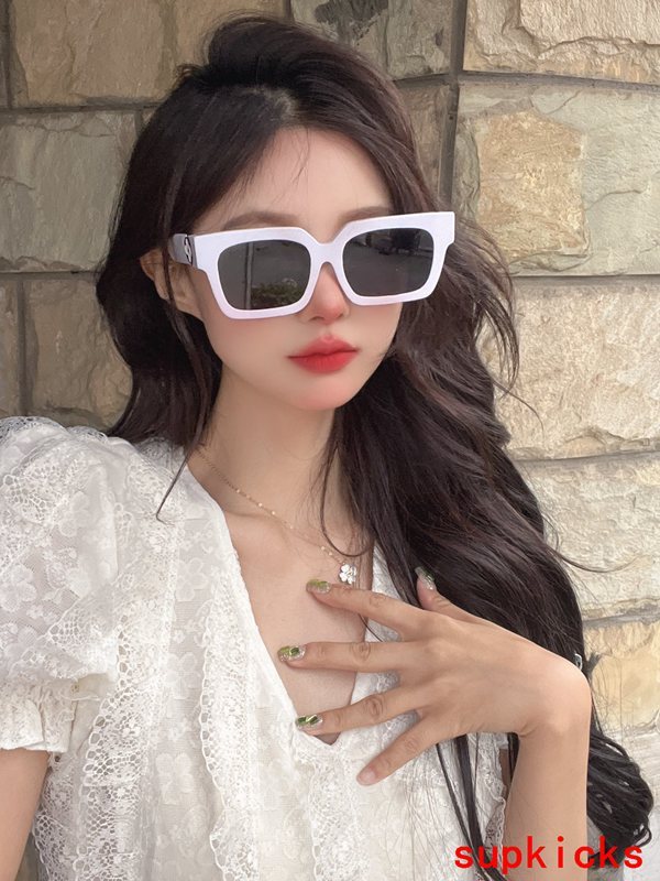 Lifestyle view of Louis Vuitton unisex sunglasses