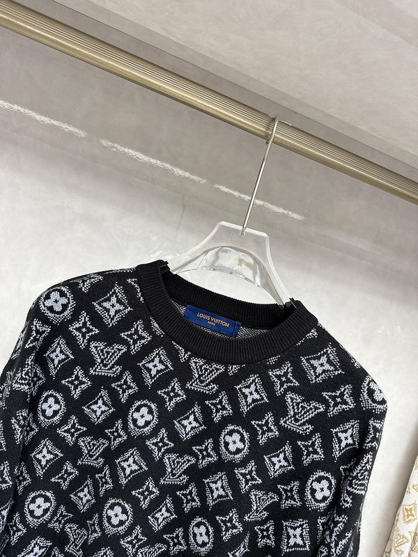 Flat lay presentation of Louis Vuitton luxury clothing with logo-detail design