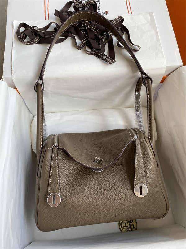 Side view of polished structured handbag