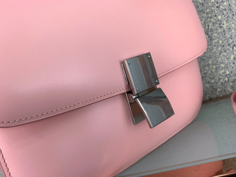 Styled lifestyle shot of modern structured women's handbag – women's statement bag