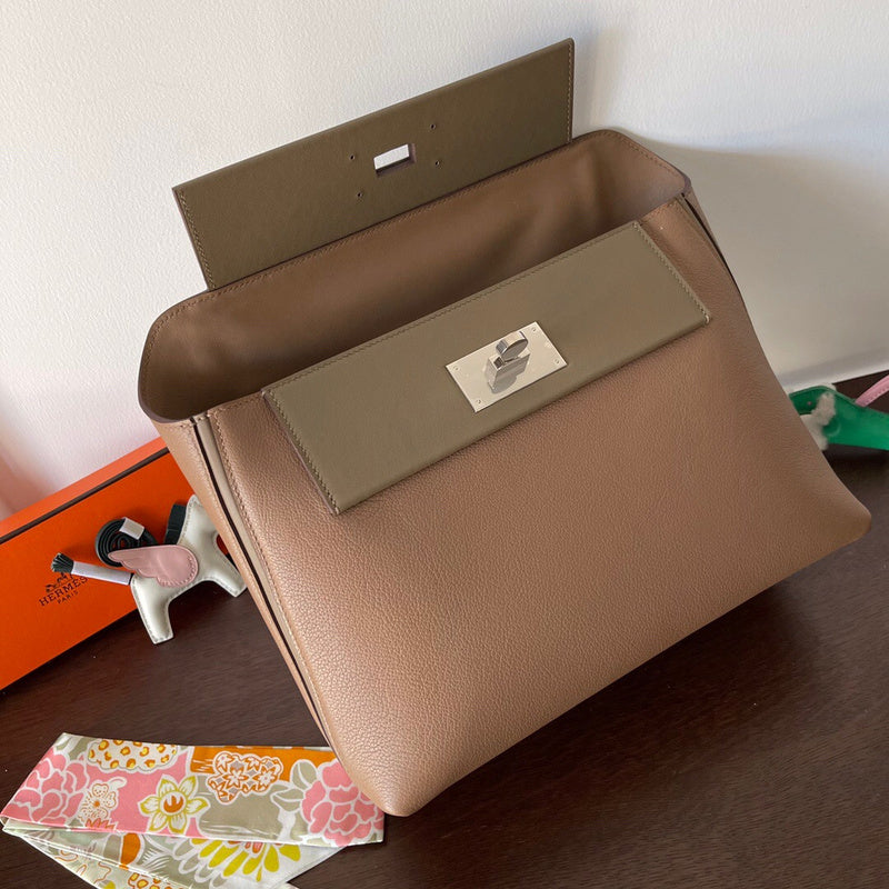 Side view of sleek structured handbag