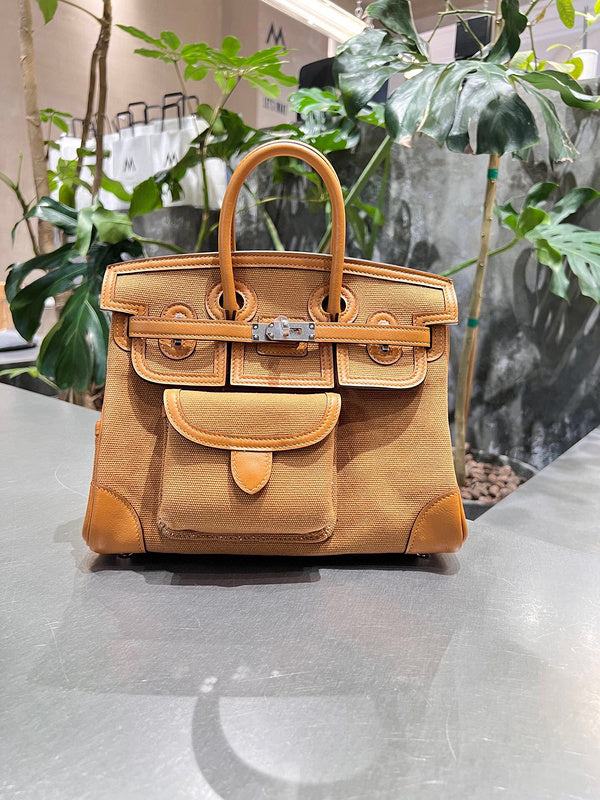 Side view of graceful structured handbag