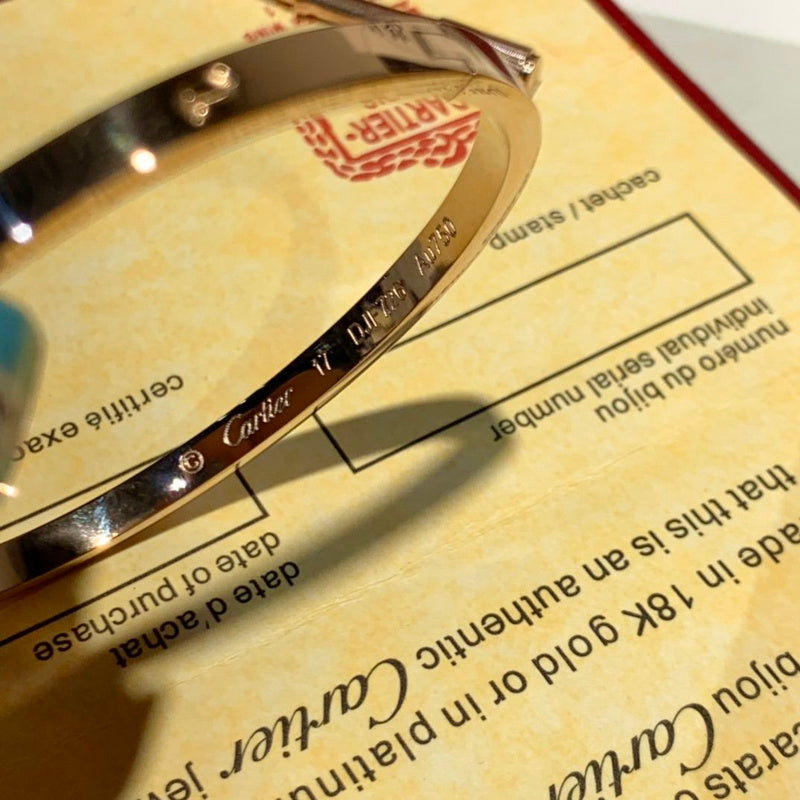 Close-up detail view of Cartier unisex jewelry piece