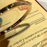 Close-up detail view of Cartier unisex jewelry piece