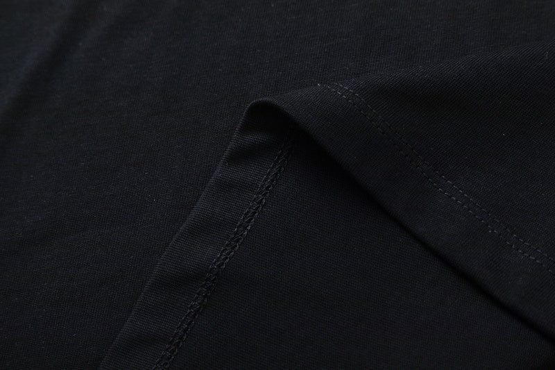 Close-up detail shot of Givenchy luxury clothing with signature branding