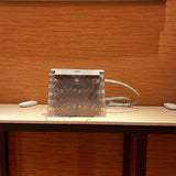 Side view of crisp structured handbag