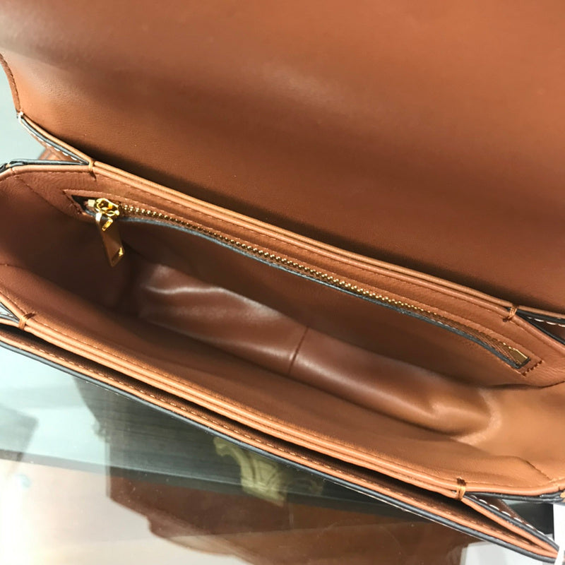 Top view of everyday-luxe polished women's handbag – women's luxury accessory