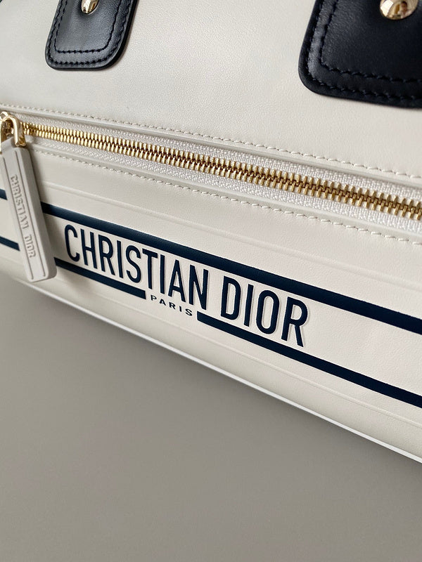 Styled lifestyle shot of signature everyday-luxe women's handbag – women's designer-style accessory