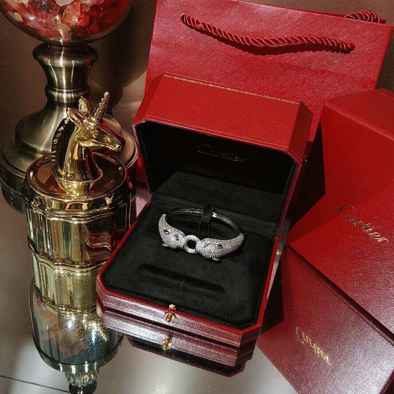 Front view of Cartier unisex jewelry piece