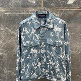 Back view of Louis Vuitton luxury clothing with label-forward styling