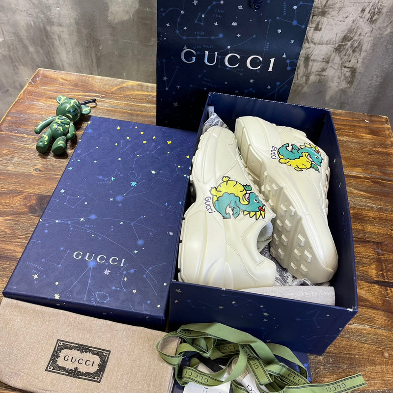 Side profile of Gucci bold contrast sneakers signature lace-up style
