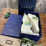Side profile of Gucci bold contrast sneakers signature lace-up style