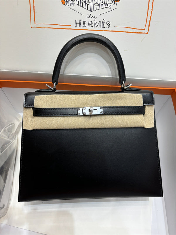 Side view of graceful structured handbag