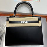 Side view of graceful structured handbag