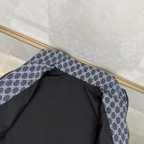 Flat lay presentation of Gucci luxury clothing with logo-detail design