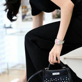  timeless top-handle bag styled with outfit 12