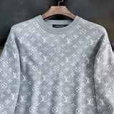 Full styled look of Louis Vuitton luxury clothing with monogram-inspired silhouette