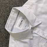 Flat lay presentation of Lacoste luxury clothing with logo-detail design