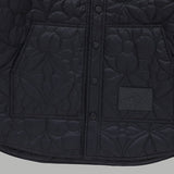 Flat lay presentation of Louis Vuitton luxury clothing with monogram-inspired silhouette