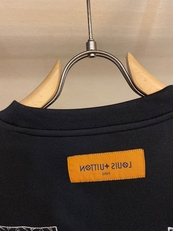 Side profile of Louis Vuitton luxury clothing with runway-inspired design