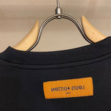 Side profile of Louis Vuitton luxury clothing with runway-inspired design