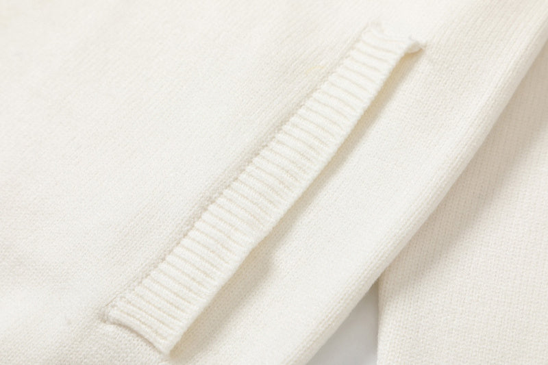 Close-up detail shot of Gucci luxury clothing with logo-detail design