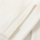 Close-up detail shot of Gucci luxury clothing with logo-detail design