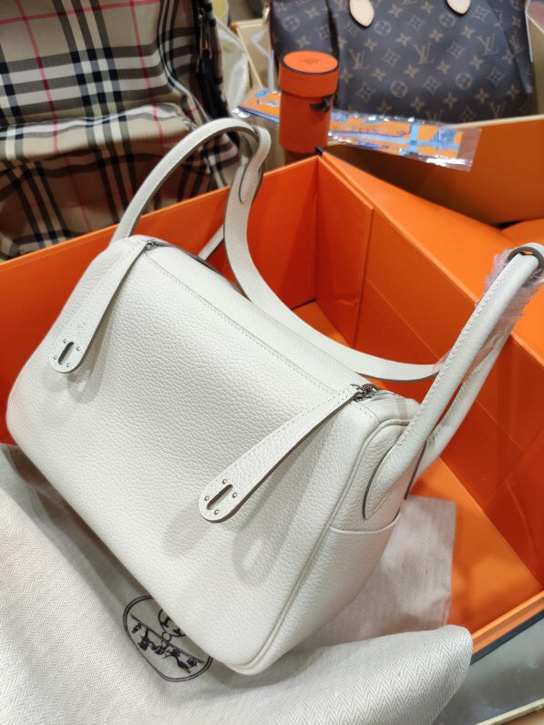  Elegant handbag carried on shoulder