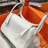  Elegant handbag carried on shoulder