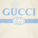 Flat lay presentation of Gucci luxury clothing with relaxed-fit cut