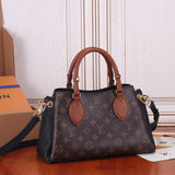  clean-lined top-handle bag styled with outfit 12