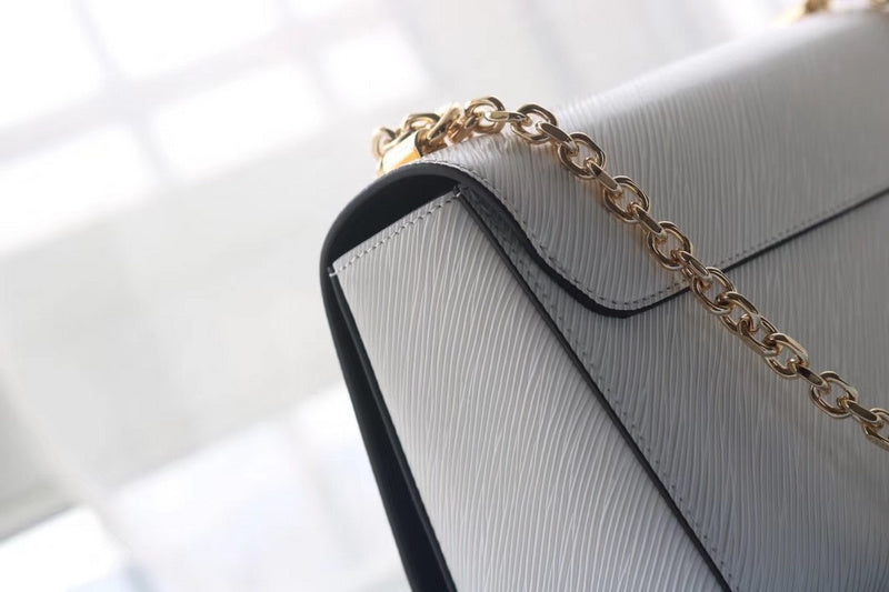 Front view of refined modern women's handbag – women's luxury accessory