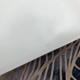 Side profile of sleek classic women's handbag – women's luxury handbag