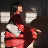 Back view of elevated modern women's handbag – women's luxury accessory