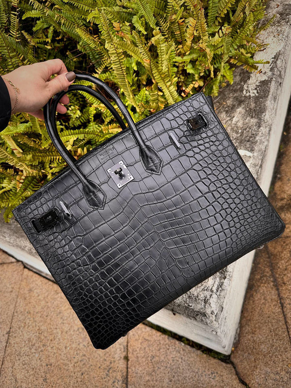 Close-up detail of understated bag design
