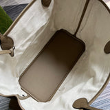 Close-up detail of signature elevated women's handbag – women's statement bag